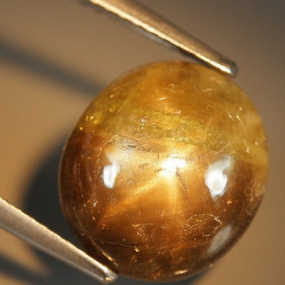Камень звездчатый жёлтый сапфир натуральный 9.04  карат арт. 19574