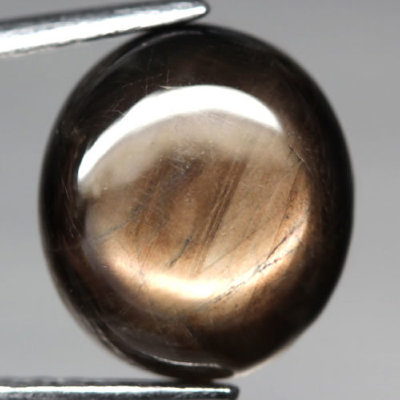  Камень черный звездчатый сапфир натуральный 6.88 карат арт. 9736