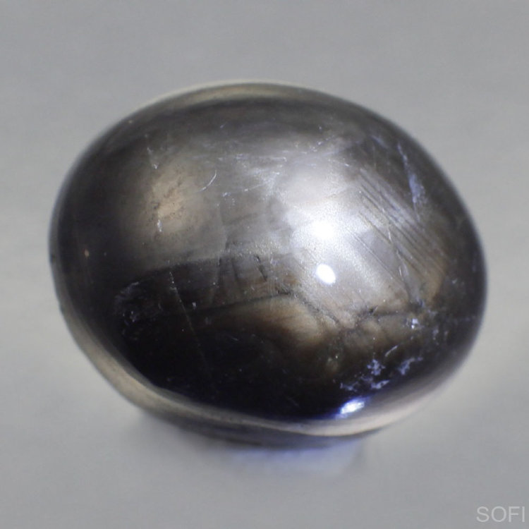  Камень черный звездчатый сапфир натуральный 5.70 карат арт. 16573
