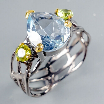 Серебряное кольцо с голубым топазом арт 40343
